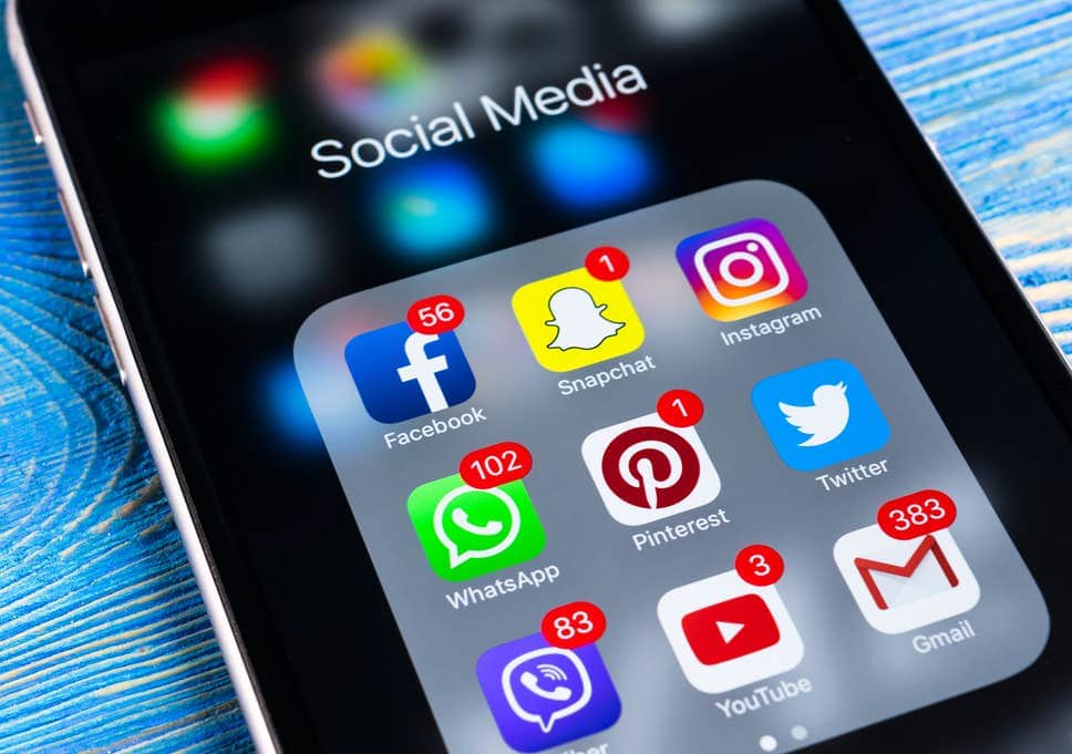 A modern smartphone screen displaying a social media app interface with detailed analytics and monitoring tools. In the foreground, a grid view shows profiles of users, with indicators highlighting those who have recently unfollowed the viewer. The middle ground features streamlined menus and settings, allowing the user to easily track and manage their follower base. The background depicts a minimalist, technology-inspired setting with soft lighting and subtle gradients, conveying a sense of control and insights into one's online presence. The overall scene should feel visually balanced, clean, and tailored to the task of identifying and understanding changes in social media followership.