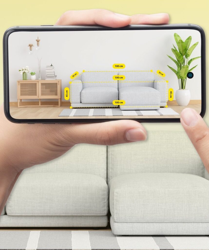 A modern smartphone is held in a professional's hand, angled towards a flat surface, showcasing a precise digital measuring app interface. The foreground features the smartphone's screen displaying measurement options, with clean lines and vibrant colors. In the middle ground, a well-organized workspace is visible, including a ruler, a notepad, and a laptop, all in muted tones to maintain focus on the phone. The background features a softly blurred laboratory setting with shelves lined with scientific equipment, creating a tech-savvy atmosphere. Warm, natural lighting highlights the smartphone and workspace, casting soft shadows for depth. Overall, the image evokes a sense of precision, professionalism, and the integration of technology in everyday measurements.